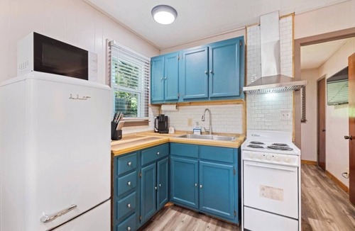 Maggie Valley Cottage | Knotty Pine Cottage-Cozy, Hot Tub, Pet Friendly!