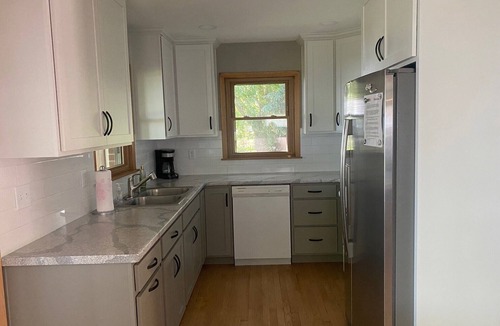 Oshkosh Cottage | Lake Winnebago Waterfront Retreat-Canoeing, Campfires & Stunning Sunsets