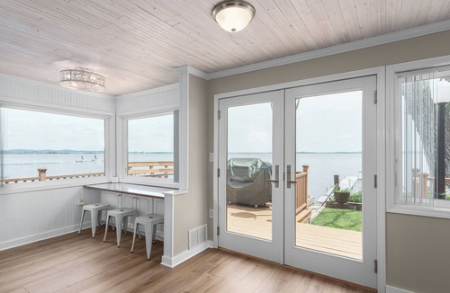 Lake Koshkonong Cottage | Lakefront Getaway with Hot Tub, Dock, & Game Room - Kosh Kottage