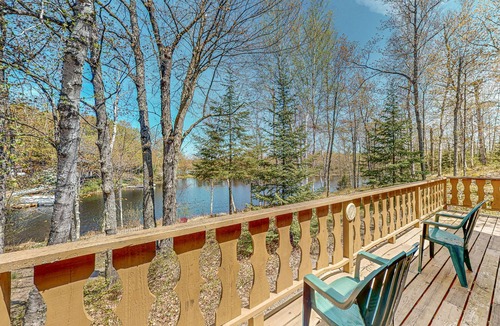 Presque Isle House | Lakefront home with large patio, fire pit, & a provided kayak