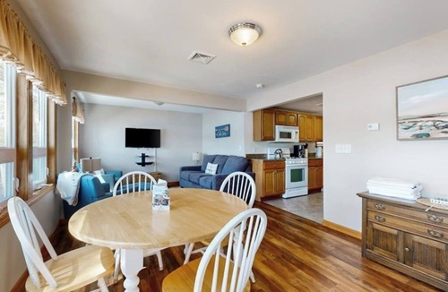 The Bays Cottage | Lakefront home with private beach, access to dock/fishing/kayaks/boat slip