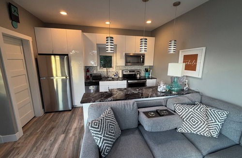 Turtle Lake House | Lakefront Luxury Modern Home With Docks, Fire Pit & Pontoon Boat Rental