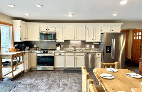 Augusta Cabin | Lakeside Log Cabin - Enjoy a beautiful sugar sand beach, Fireplace