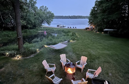 Augusta Cabin | Lakeside Log Cabin - Enjoy a beautiful sugar sand beach, Fireplace