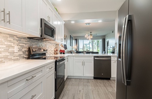 Naples Condo | Lely Greenlinks Resort -White Orchid-Luxury Renovated Modern 1st flr 3bd