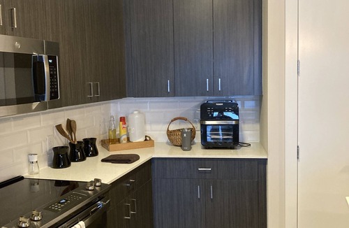 Troy Condo | Luxurious 3/2 Condo in Troy's Finest Building – Prime Location for World-Class