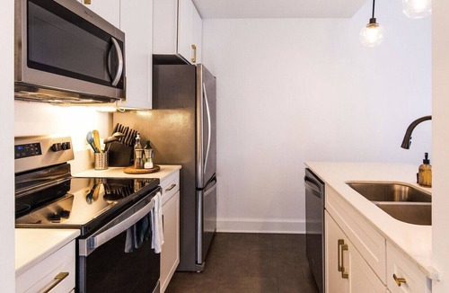 East Town Apartment | Luxury Downtown Apt with Parking, Gym, and Lap Pool · Sleeps 4-5