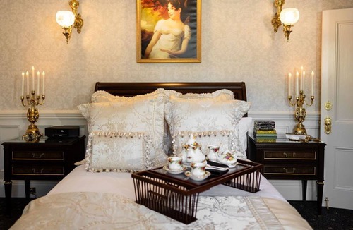 Thompson House | Luxury guest rooms in recently restored 1845 Gothic Revival Mansion.