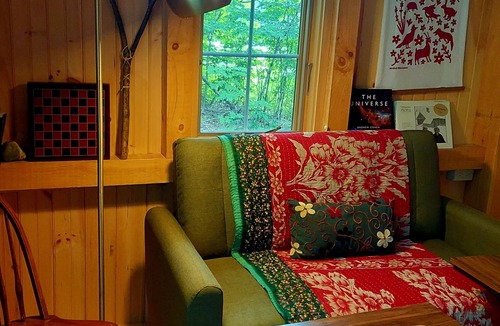Craftsbury Cabin | Northwoods Guest Cabin & porch overlooking private woods and stream