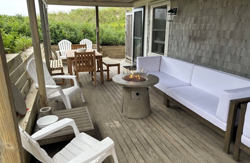 East Sandwich Cottage | Ocean front oasis with renovation nestled in the dune on a private beach.