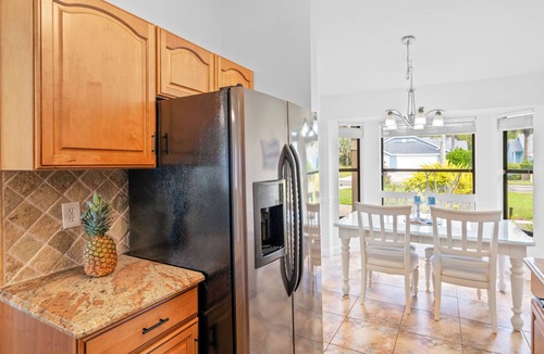Naples House | Peaceful Lakeview 3BR. Heated Pool Retreat.