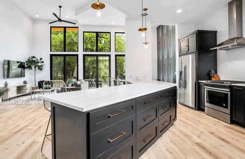 Elmhurst Heights House | Pool + Mural Patio | South Austin Retreat