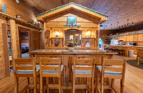 Rapid River House | Rapid River Lodge: Ease into Summer – Relax by the River!