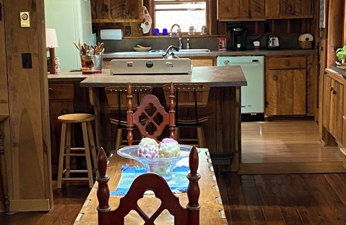 Rockbridge Baths Cabin | Retreat by the Rivah Experience this three bedroom custom built cabin, sleeps 8