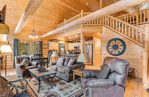 Lyndon Station House | Riverfront cabin with a dock, kayaks and a canoe - firepit and water views