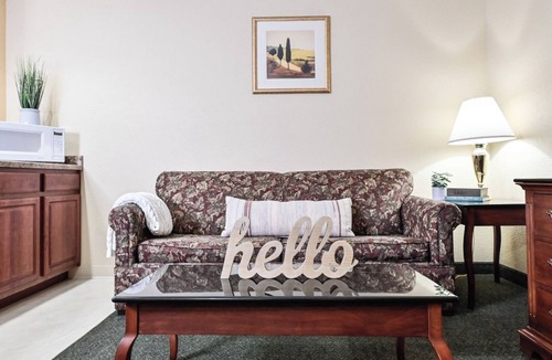 Pembine Hotel | Romantic Island Escape! | Pet Friendly King Suite w/Onsite Dining, Pool & Bar!