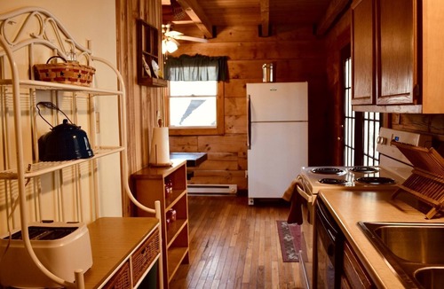 Mingo House | Rustic Wooden Cabin Settled Between Trees in Monterville, West Virginia