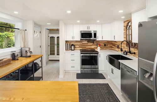 Rainier Valley House | Seattle Hillside Retreat I Lake Views & Huge Deck