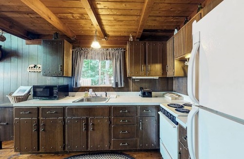 Parsonsfield House | Secluded waterfront cabin with private dock, kayak, canoe, gas grill & deck