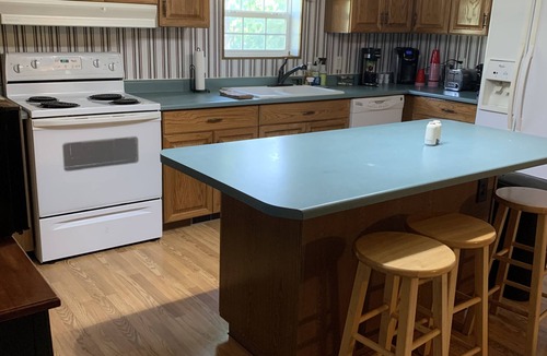 Sycamore House | Serene Getaway nestled in country, 4 bedroom 2 bath. Covered patio cooking area.