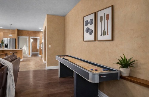 Olympia House | Sleeps 16 on 1.3 private acres near Boston Harbor. Spacious 6BR home with hot tub, game room, exercise equipment & large gathering spaces. Ideal for groups & families seeking privacy, comfort & fun with room to spread out and enjoy time together.