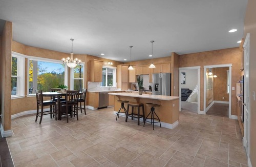 Olympia House | Sleeps 16 on 1.3 private acres near Boston Harbor. Spacious 6BR home with hot tub, game room, exercise equipment & large gathering spaces. Ideal for groups & families seeking privacy, comfort & fun with room to spread out and enjoy time together.