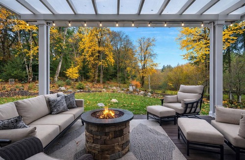 Olympia House | Sleeps 16 on 1.3 private acres near Boston Harbor. Spacious 6BR home with hot tub, game room, exercise equipment & large gathering spaces. Ideal for groups & families seeking privacy, comfort & fun with room to spread out and enjoy time together.