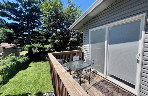 Sioux Falls House | Spacious 4-BR, 2.5 Bath vacation home: Foosball, 65" TV, Golf, 4 Season Room