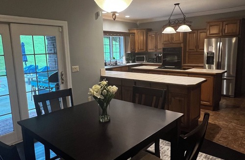 Dayhoit House | Spacious 5-bedroom house in historic Harlan! In-ground Pool/Hot Tub/Game Room