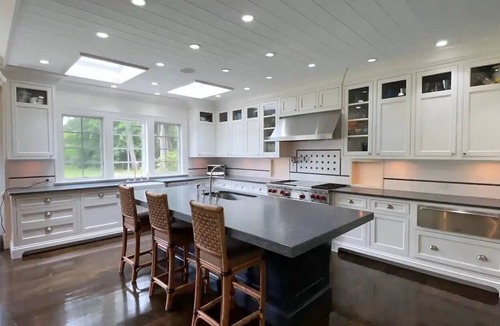 Old Brookville House | Spacious Hampton style house with giant indoor basketball court.