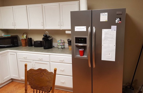 Athens House | Spacious suite with fenced back yard, deck, gas grill, fireplaces and splash pad