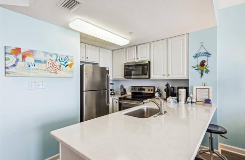 Lower Grand Lagoon Condo | Stunning View Summer dates still availalble free beach service book now!