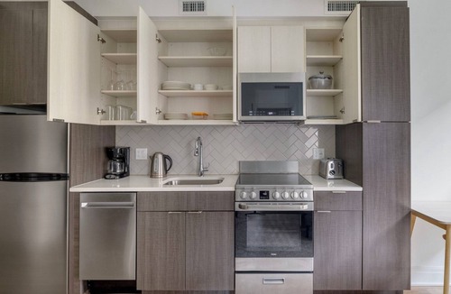 Capitol Hill Apartment | Sweet SW Waterfront 1BR w/Gym & Roof Pool, nr Train, by Blueground