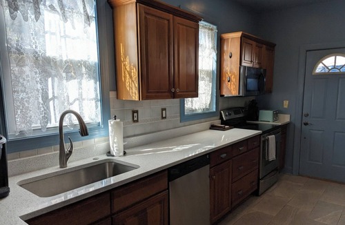 Huntington House | The Blue House – Eclectic Art Haven Near Marshall & Huntington’s Best Parks