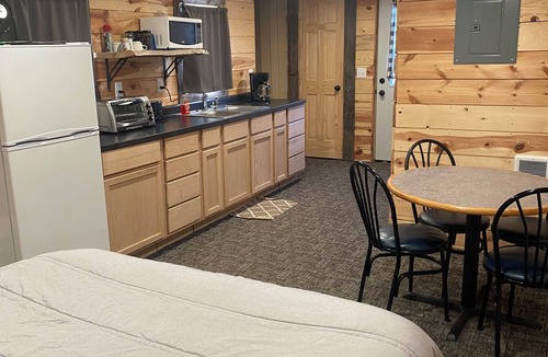 Luverne Cabin | The Little Red Barn - Lakeside Tiny Home Rental -Sleeps 4 - Spiral Staircase
