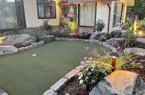 Redmond House | Timber & Springs Retreat: Indoor Pool Hot Tub Theater Room Putting Green