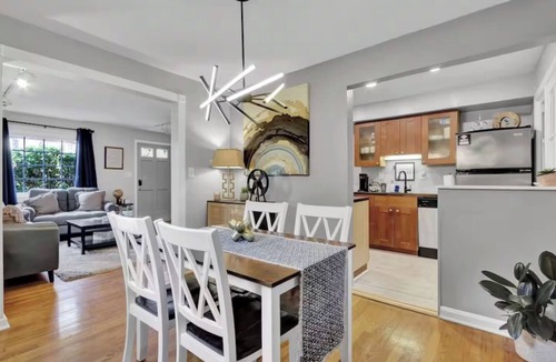 Potomac West House | Unique duplex that has 2 family rooms and 2 kitchens