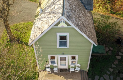 Almelund Cottage | Unity Farm: Three private cottages set across restored prairie and forest along the St. Croix River, with a barn and tennis courts.