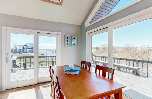 Livingston House | Updated lakefront home & studio with water views, hot tub, dock & game room