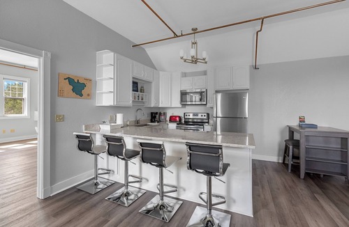 Elkhart Lake Condo | Waterfront Condo, Private Beach, Outdoor Pool & Hot Tub & Walkable to Downtown