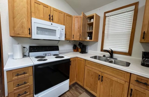 Jim Falls House | Waterfront legacy farm cottage house with WiFi, AC in lovely Eau Claire
