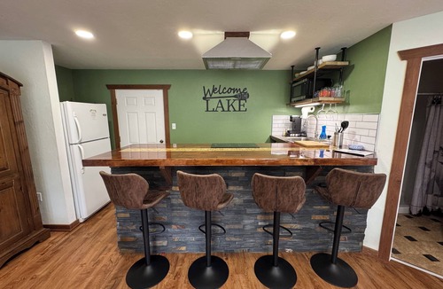 Longtown Apartment | Waterfront Studio with Hot Tub & Fire Pit Sleeps 4