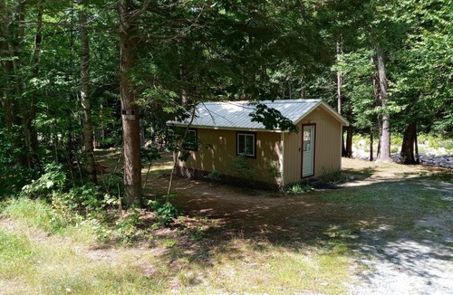 Woodsville Cabin | White Mountain scenic river camp with cozy cabin & comfy RV