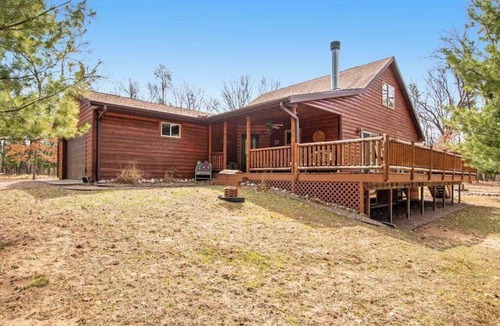 Nekoosa House | Wilderness retreat near the lake with firepit, grill, large deck - dog friendly