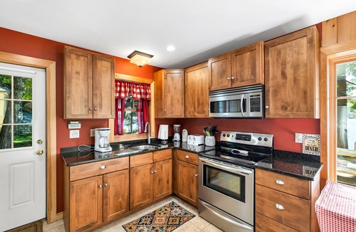 Moultonborough House | Winnipesaukee Waterfront Chalet with Sandy Beach Private Dock and Fire Pit