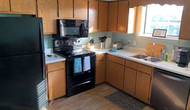 2-bedroom condo in tranquil Clemson with cool AC, walkable to campus.