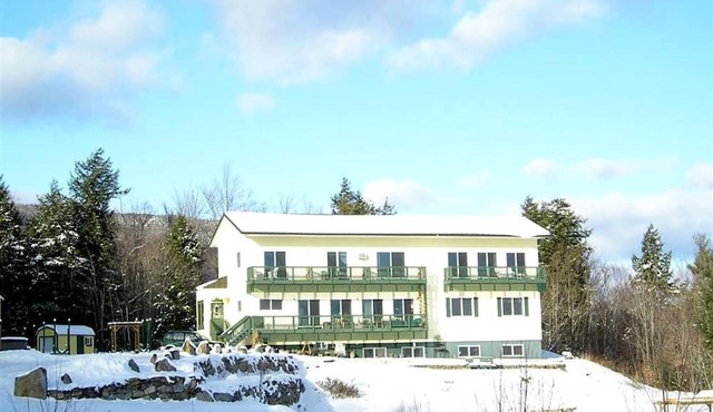 Cozy Suite Rental in a Bed and Breakfast with Fireplace and Magnificent Mountain Views near New Hampshire's Newfound Lake