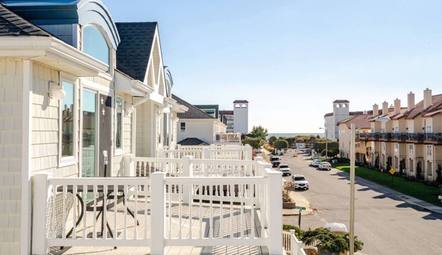 Great location, ocean + bay view, seasonal heated pool, garage, bikes, modern