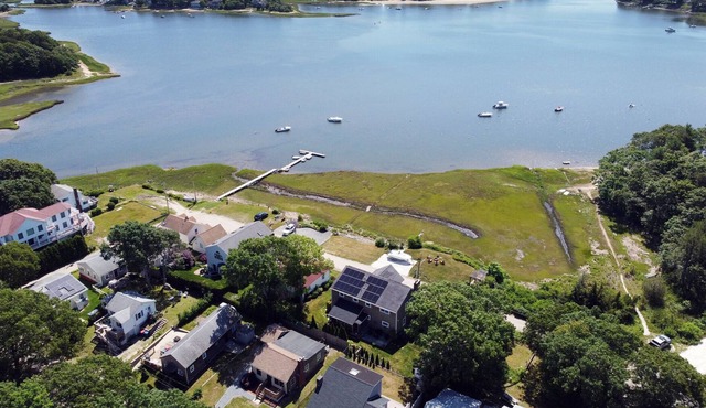 Ocean views from front porch and rear patio, walking distance to Agawam Beach.