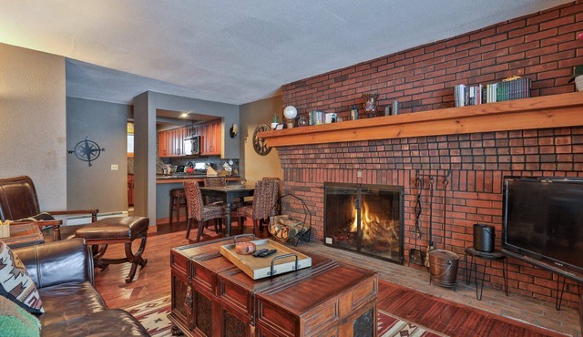 Ski-In/Ski-Out Sunrise Village Condo | 2BR, Fireplace, Pool
